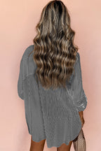 Black stripe long shirt from Mommas Hive with roll-tab sleeves and chest pockets, made of polyester and cotton blend.