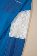 Mommas Hive Bonbon lace floral patchwork blouse with V-neck, rib knit, long sleeves, and stitched details.
