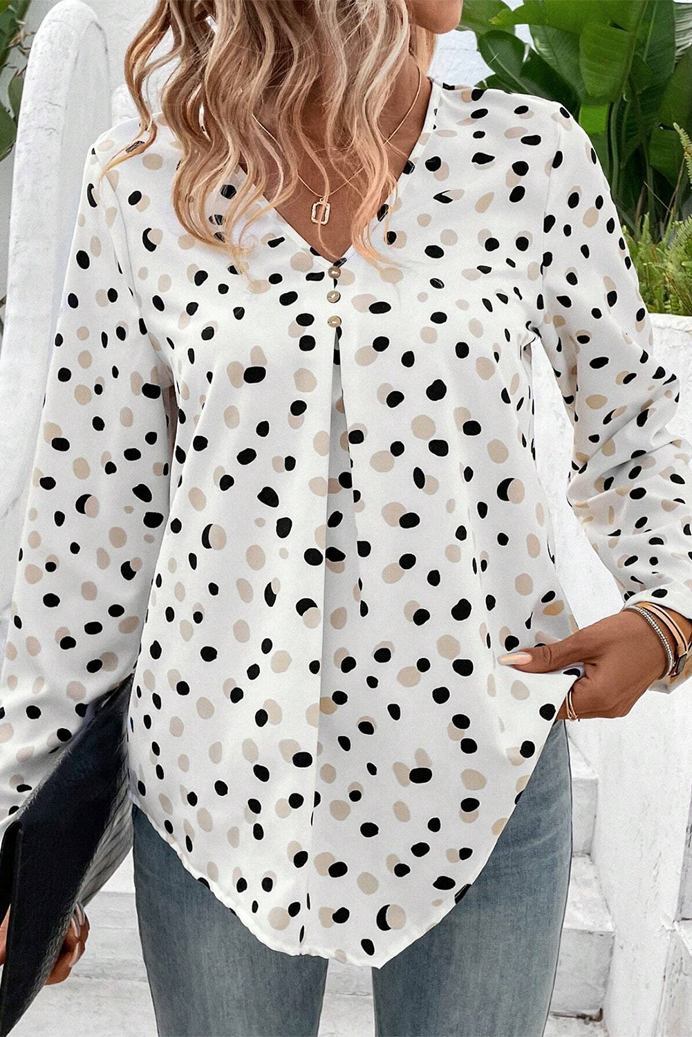 Green polka dot print blouse from Mommas Hive featuring a button front and V-neck, made of lightweight polyester.
