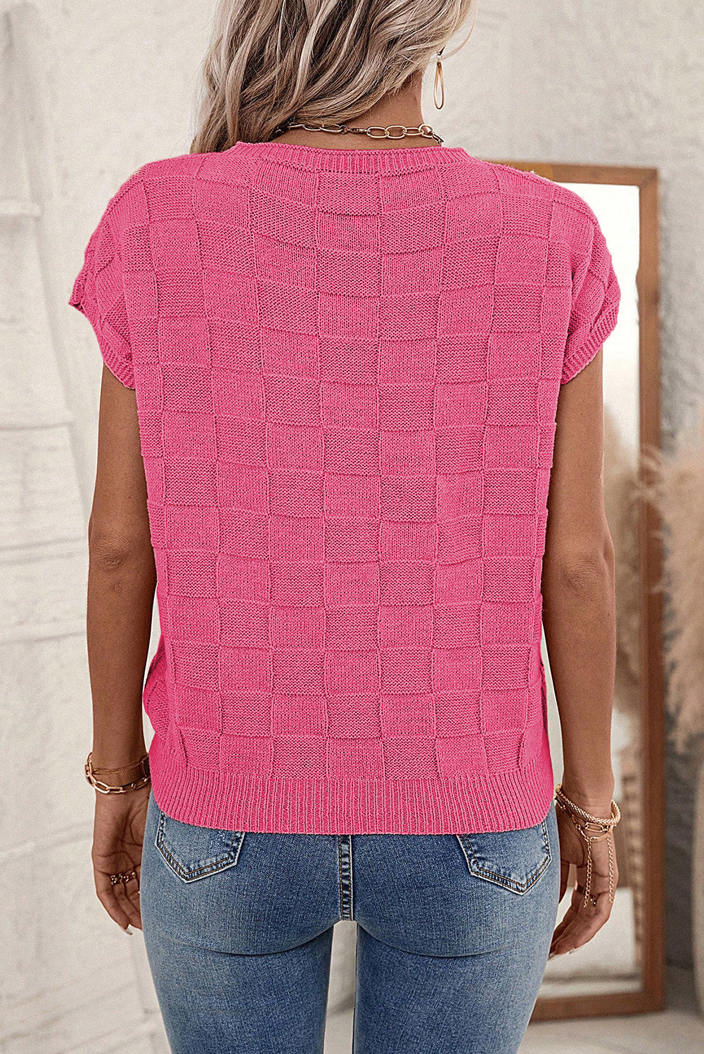 Bright pink lattice textured knit short sleeve sweater by Mommas Hive, showcasing a stylish, cozy knit top with a vibrant pattern.