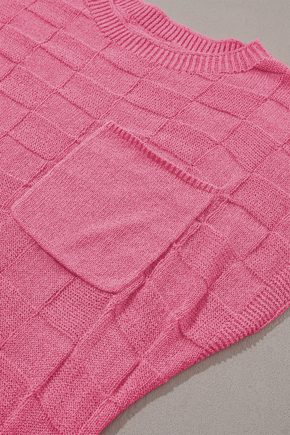 Bright pink lattice textured knit short sleeve sweater by Mommas Hive, showcasing a cozy, stylish top with a textured design.