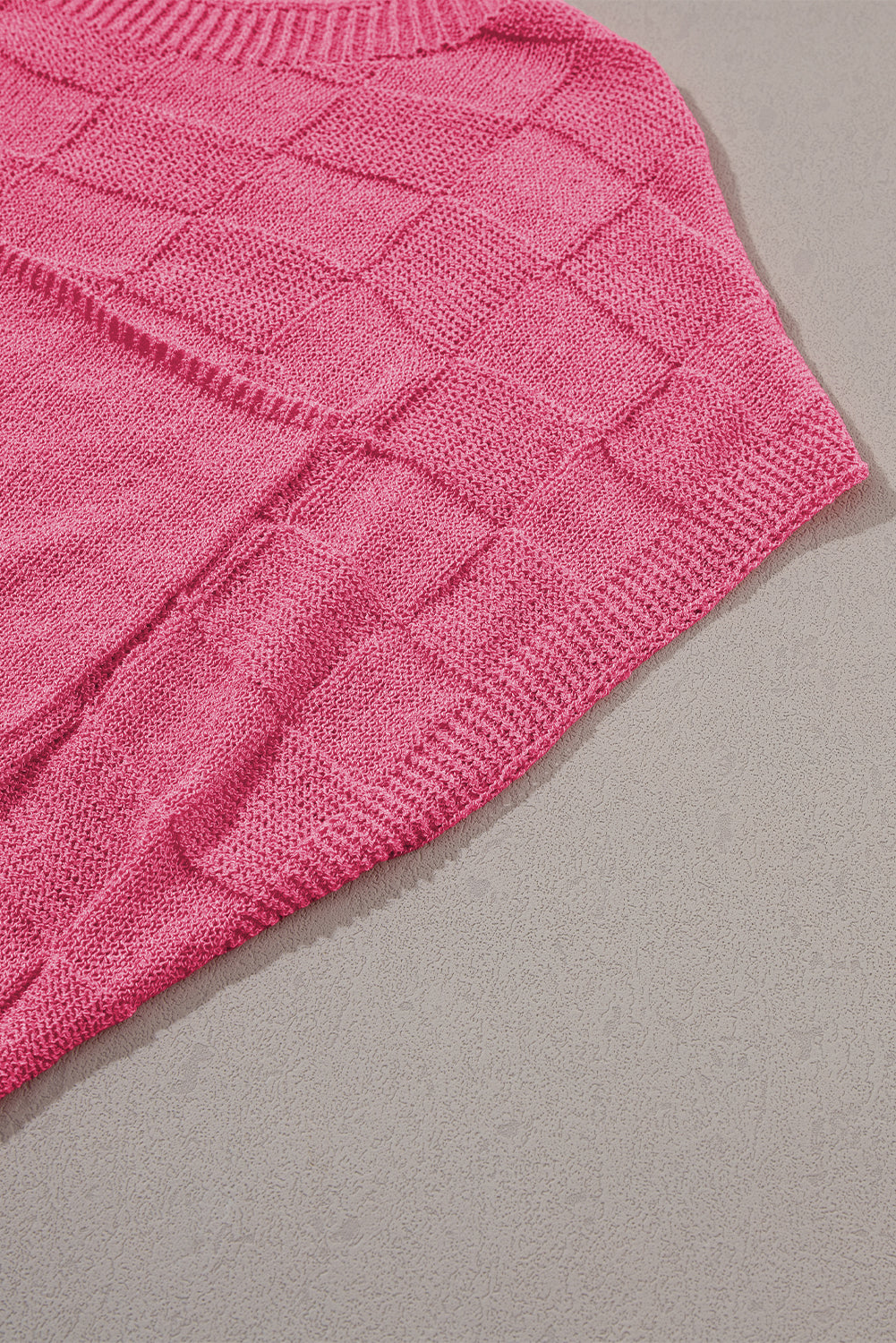 Bright pink lattice textured knit short sleeve sweater by Mommas Hive, showcasing a stylish, cozy tops design with short sleeves.