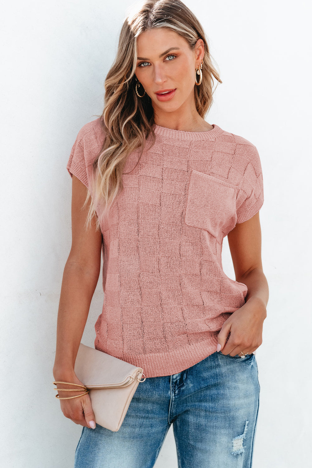 Bright pink lattice textured knit short sleeve sweater by Mommas Hive, showcasing a stylish, cozy top with a vibrant design.