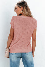 Bright pink Mommas Hive knit short sleeve sweater with lattice textured design, made from acrylic and polyamide fibers.