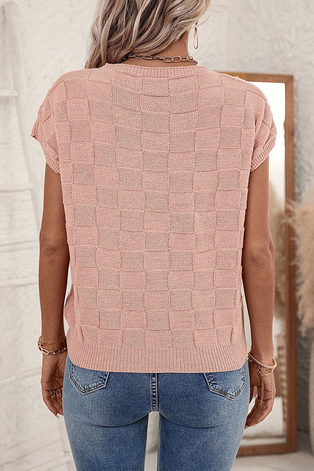 Bright pink lattice textured knit short sleeve sweater from Mommas Hive, showcasing a stylish, cozy knit top.