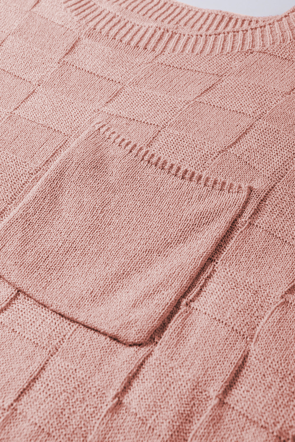 Bright pink lattice textured knit short sleeve sweater by Mommas Hive, showcasing a cozy, stylish top with a textured pattern.