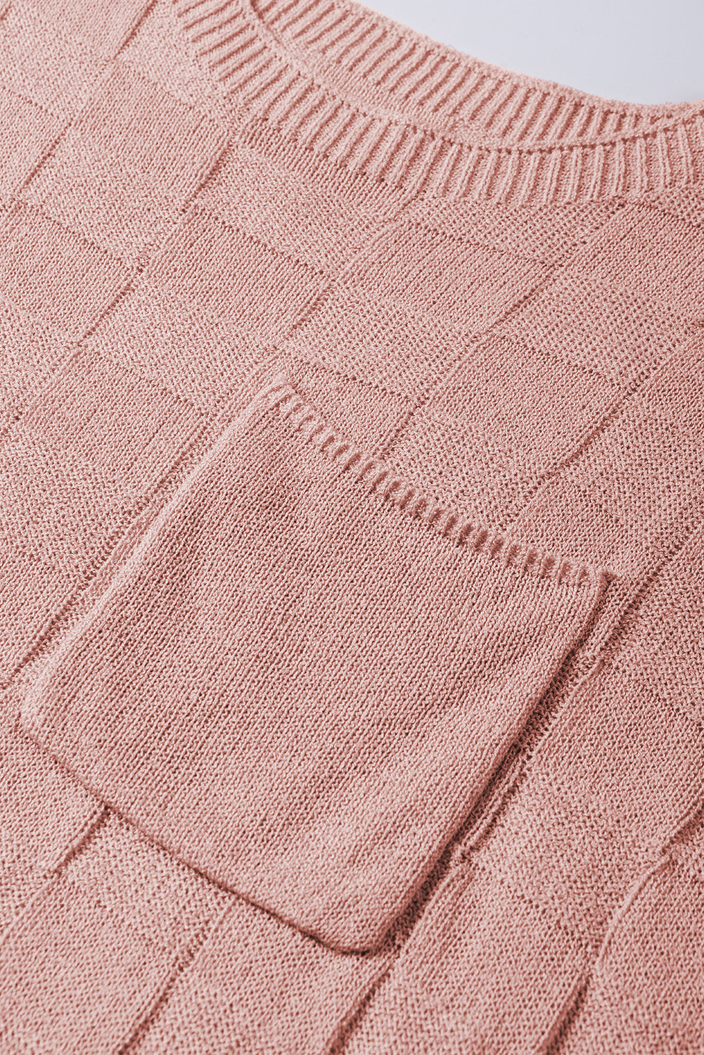 Bright pink lattice textured knit short sleeve sweater from Mommas Hive, showcasing a stylish, cozy top with a vibrant design.
