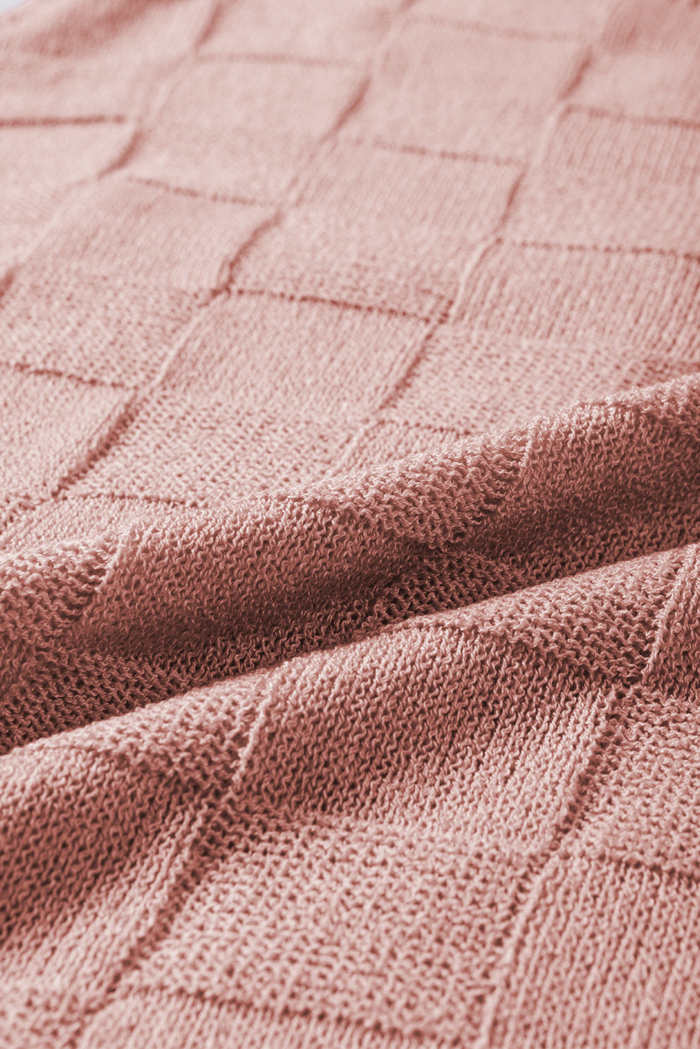 Bright pink lattice textured knit short sleeve sweater from Mommas Hive, showcasing a stylish and cozy top design.