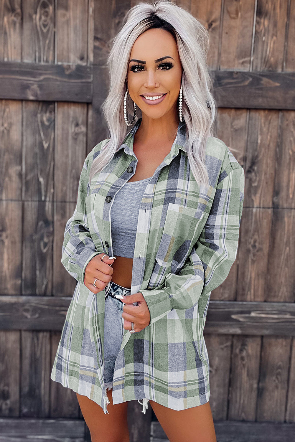 Pink plaid button-up patch pocket shirt from Mommas Hive, featuring long sleeves and a classic collar for casual style.