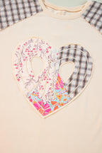 Beige plaid floral peace heart graphic long sleeve top by Mommas Hive, featuring wide fit and casual style.