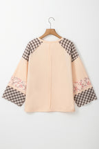 Beige plaid floral peace heart graphic long sleeve top by Mommas Hive, featuring a wide fit and casual style.