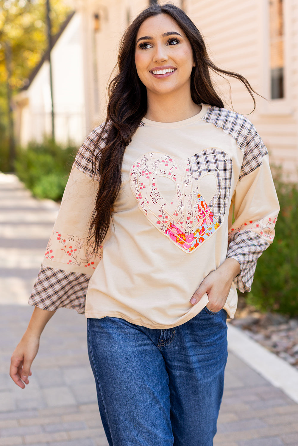 Beige plaid floral peace heart graphic long sleeve top by Mommas Hive, showing wide fit and casual style.