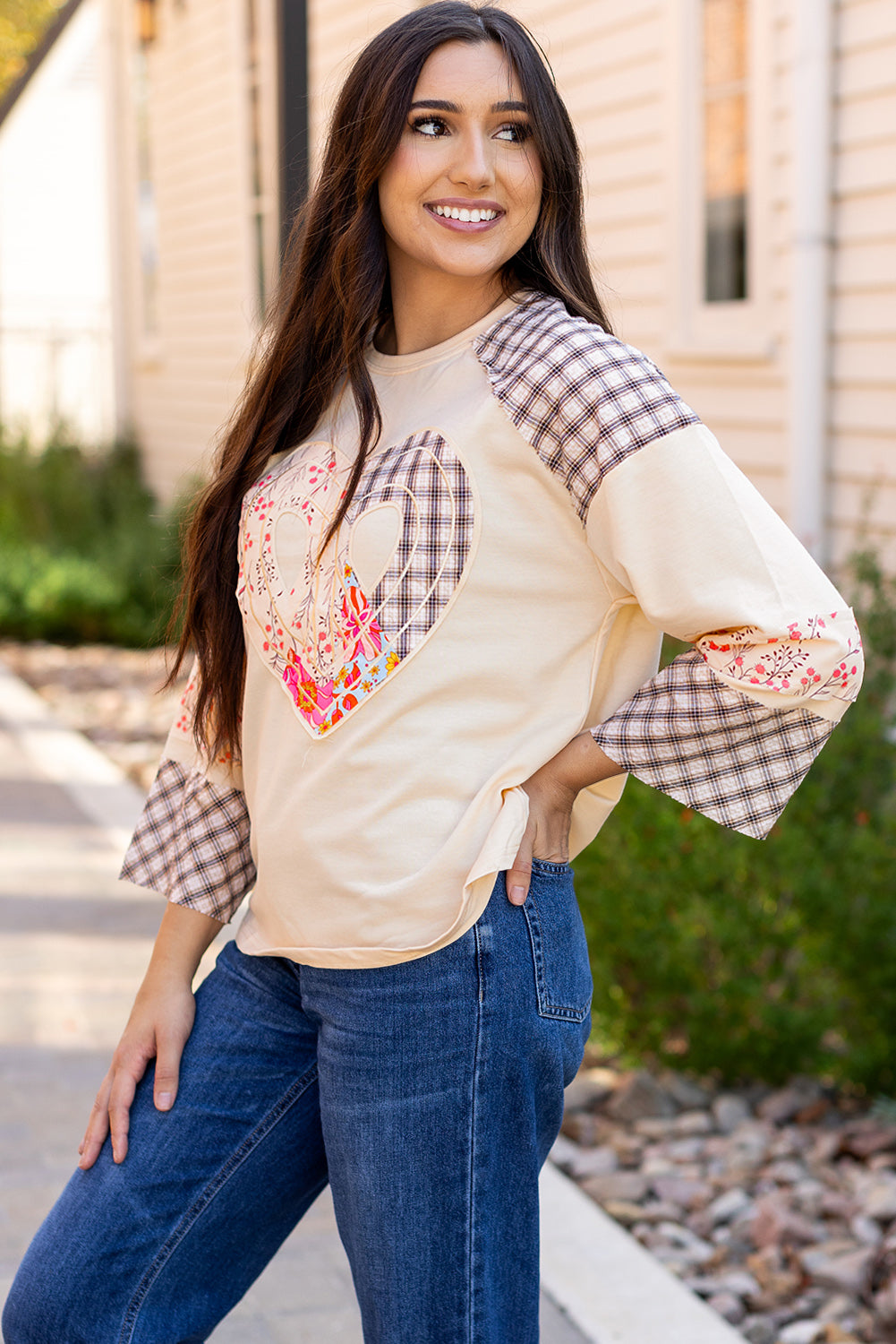 Beige plaid floral peace heart graphic long sleeve top by Mommas Hive, featuring a wide fit and soft fabric blend.
