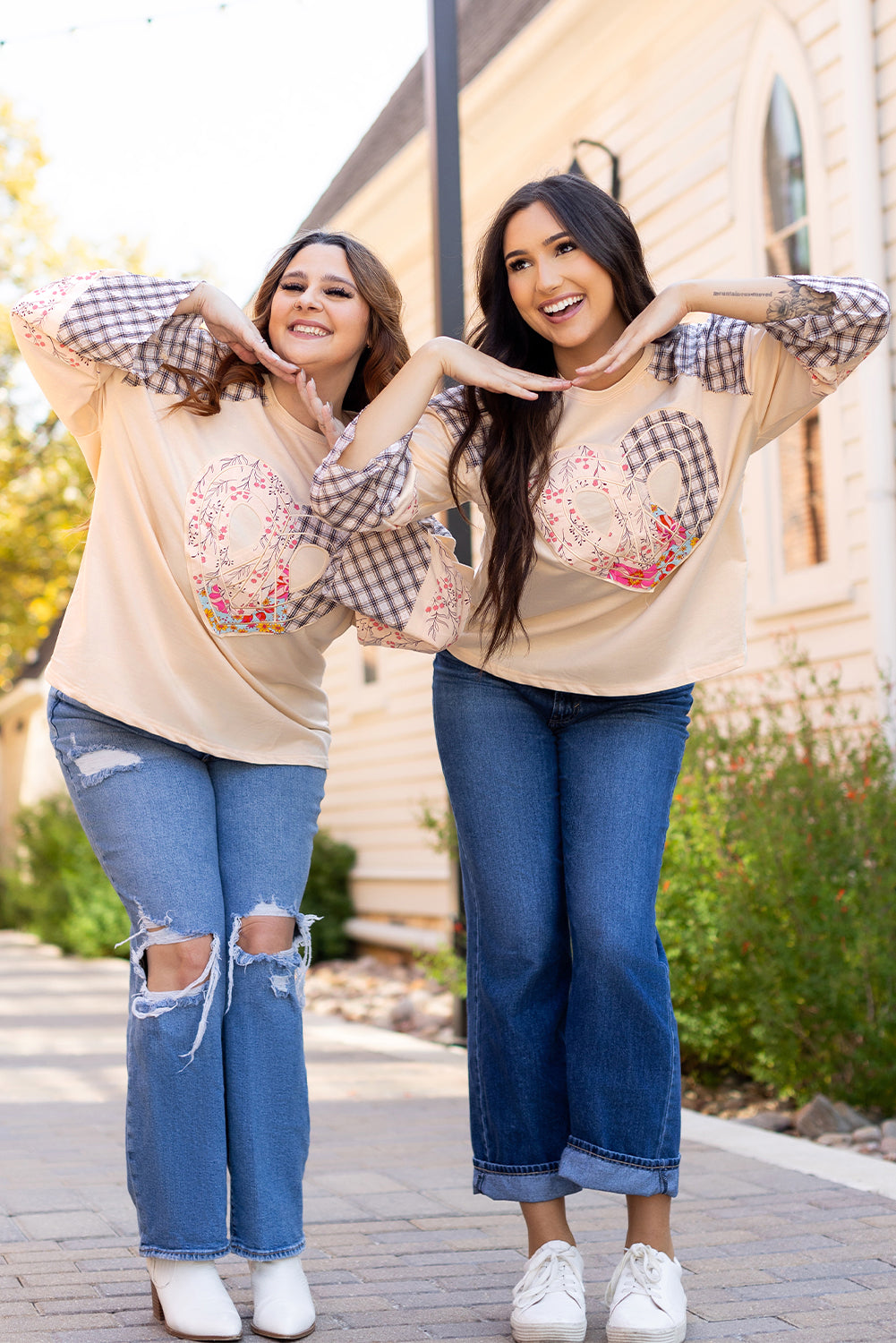 Beige plaid floral peace heart graphic long sleeve top by Mommas Hive, featuring wide sleeves and a casual, comfortable fit.