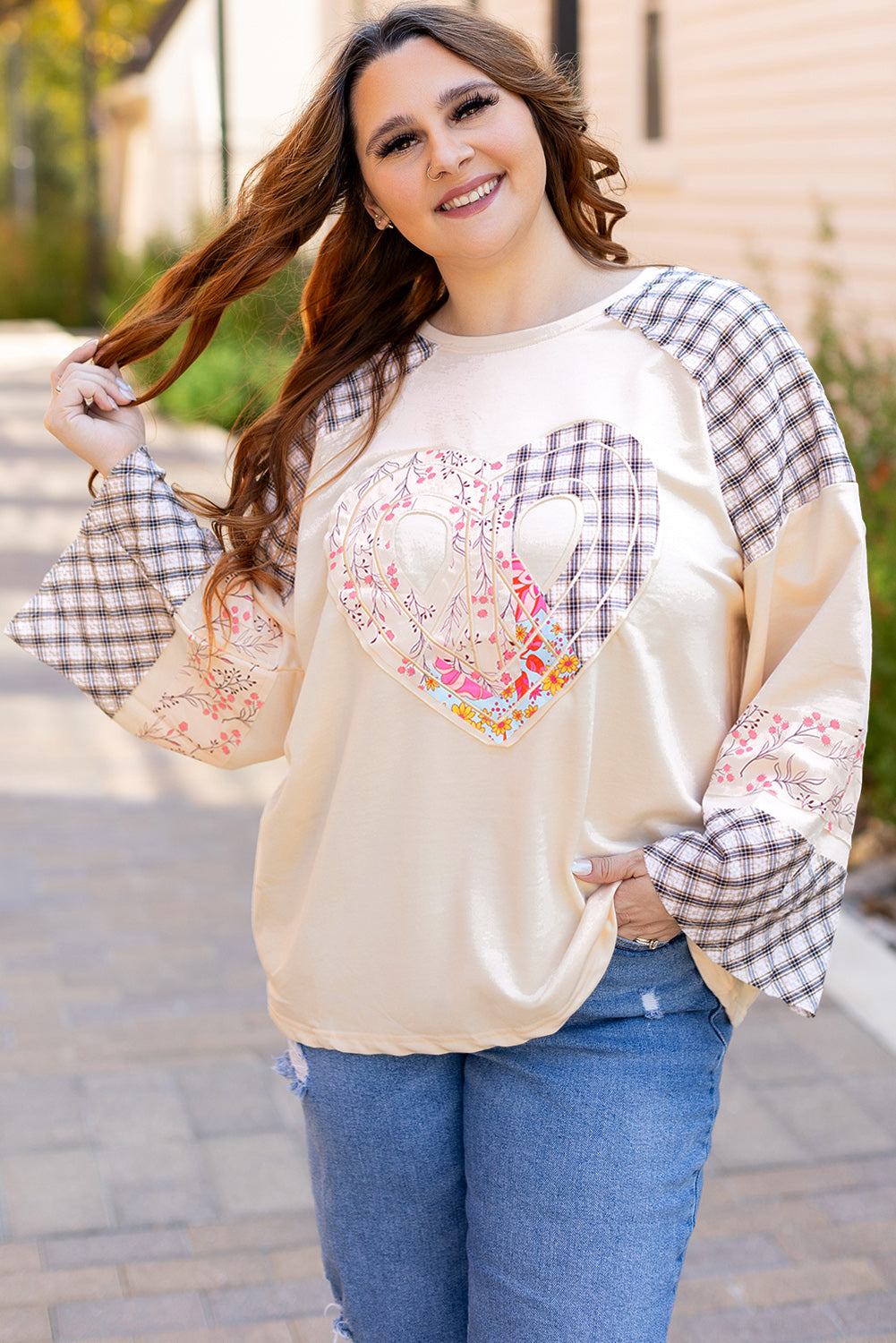 Beige plaid floral peace heart graphic wide long sleeve top by Mommas Hive, featuring a relaxed fit and stylish design.