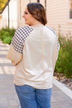 Beige plaid floral peace heart graphic long sleeve top by Mommas Hive, featuring wide fit and casual style.