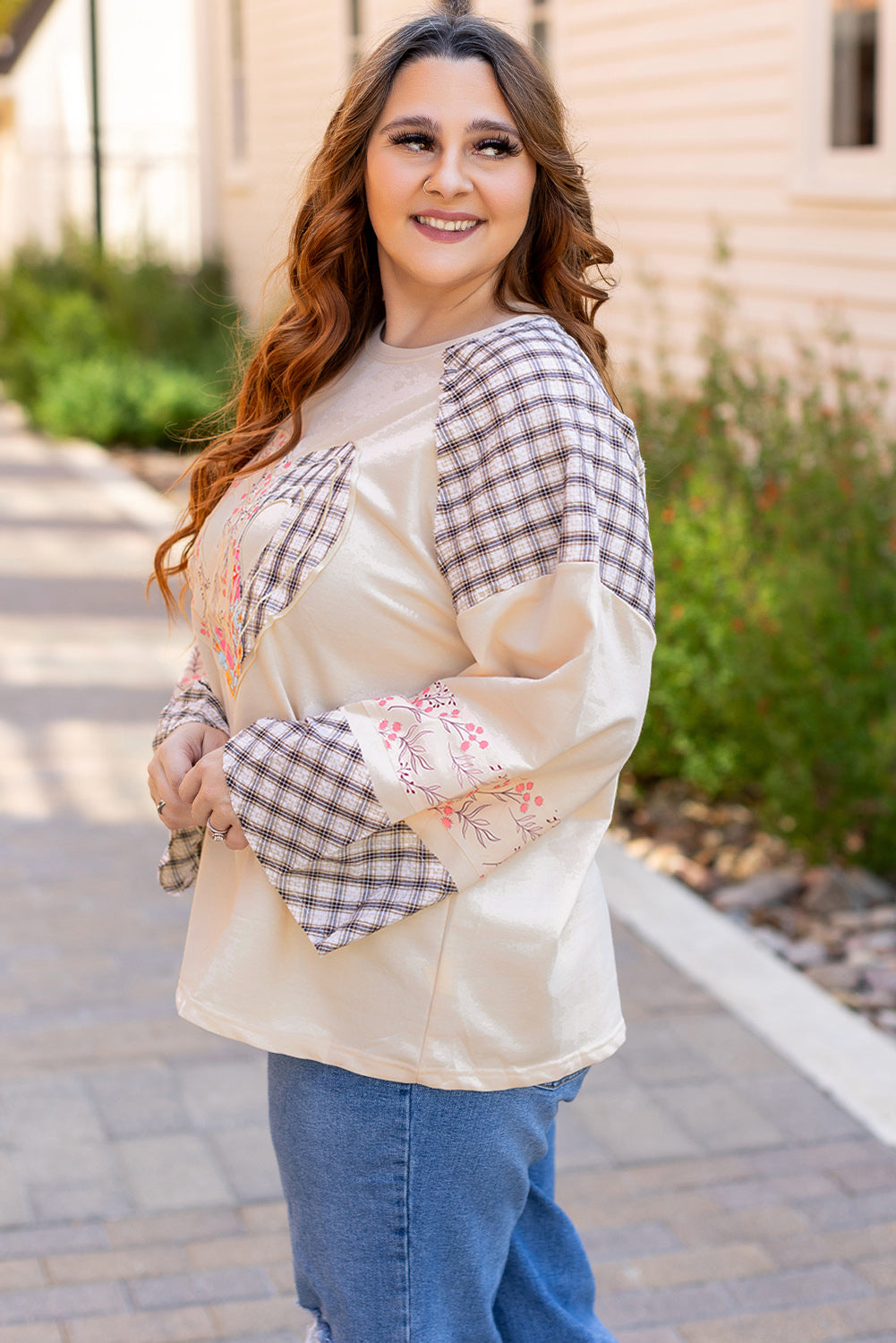 Beige plaid floral peace heart graphic long sleeve top by Mommas Hive, featuring a wide fit and casual style.