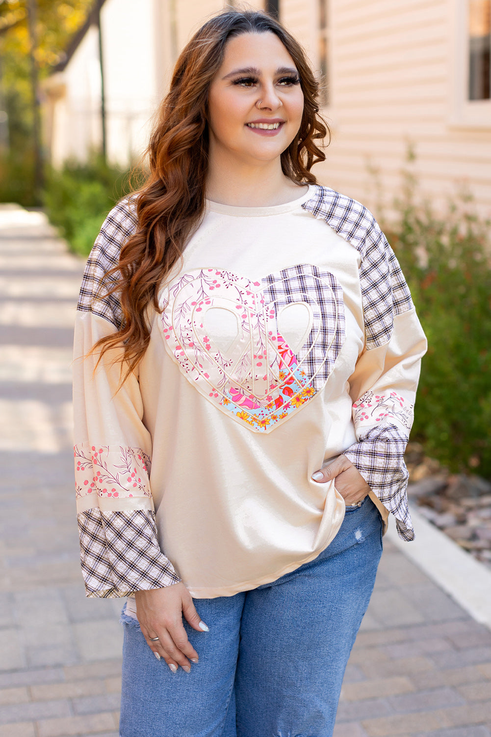 Beige plaid floral peace heart graphic long sleeve top by Mommas Hive, featuring wide fit and casual style.