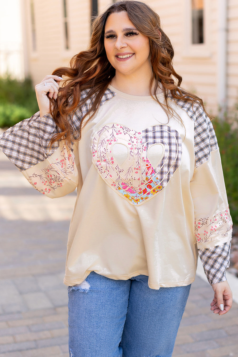 Beige plaid floral peace heart graphic long sleeve top by Mommas Hive, featuring a wide fit and casual style.
