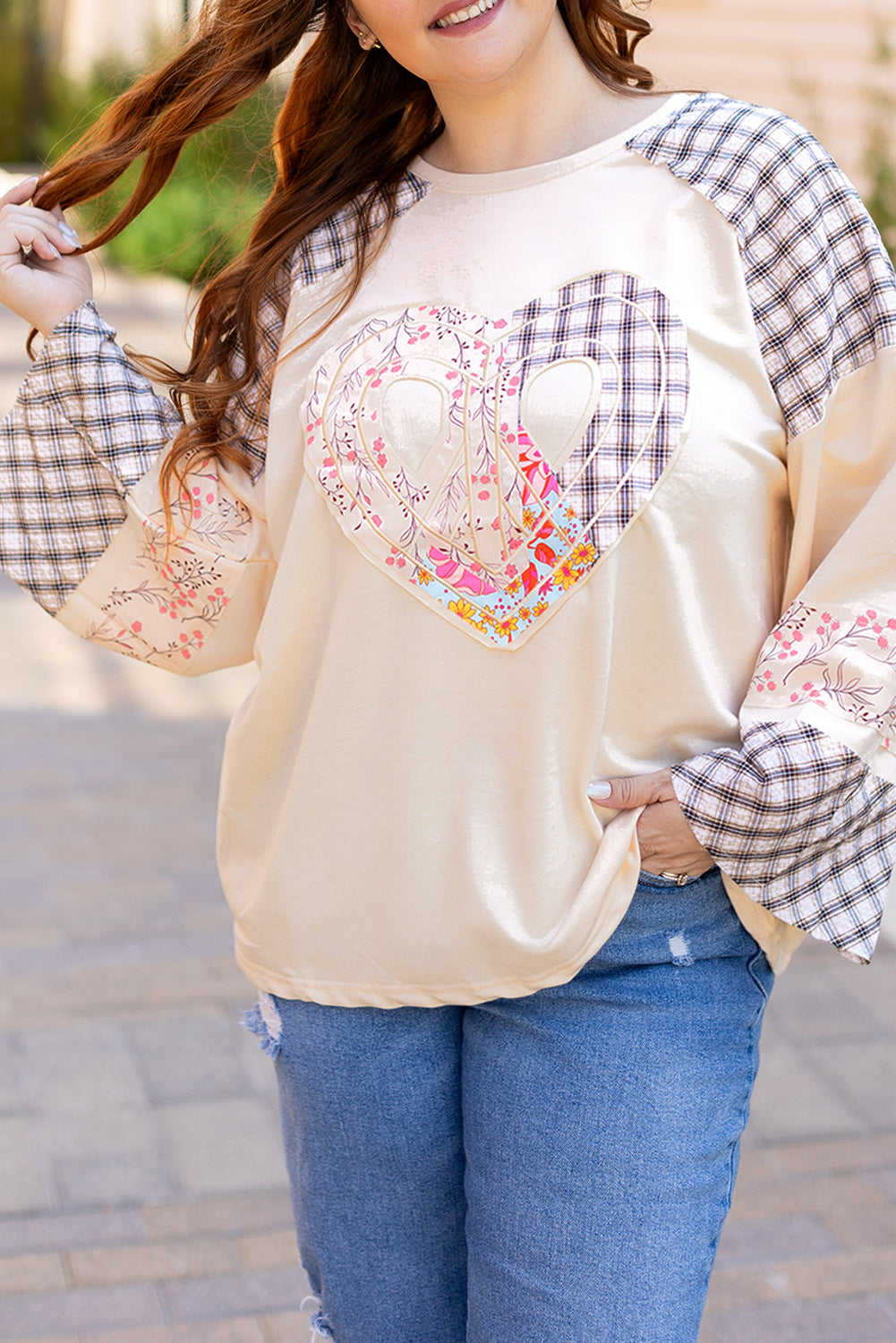 Beige plaid floral peace heart graphic long sleeve top by Mommas Hive, featuring wide sleeves and casual style.