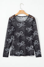 Black long sleeve mesh top with a round neck and bow print by Mommas Hive, featuring a fitted design and sheer fabric.