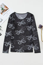 Black round neck long sleeve mesh top with bow print from Mommas Hive, featuring a fitted design and sheer fabric.