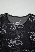 Black long sleeve mesh top with bow print and round neck from Mommas Hive, stylish and lightweight for casual wear.