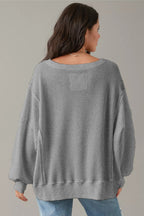 Gray waffle knit oversized top with bishop sleeves and split design, made by Mommas Hive, long sleeve casual women's blouse
