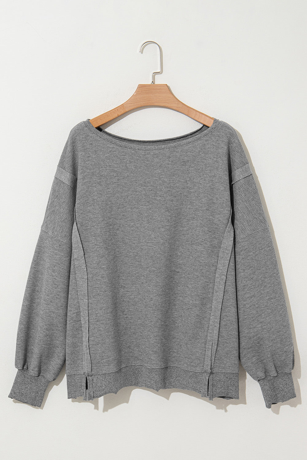 Gray waffle knit bishop sleeve split oversized top by Mommas Hive, long sleeve style with relaxed fit and stylish design.