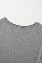 Gray waffle knit bishop sleeve split oversized top by Mommas Hive, long sleeve design with relaxed fit and stylish split detail.