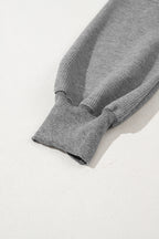 Gray waffle knit bishop sleeve oversized top by Mommas Hive, featuring split design and long sleeves.