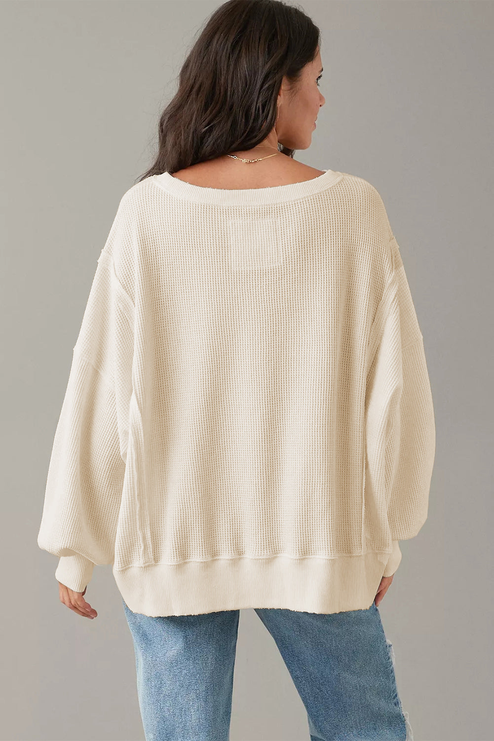 Gray waffle knit bishop sleeve split oversized top by Mommas Hive, long sleeve casual women's blouse with relaxed fit.