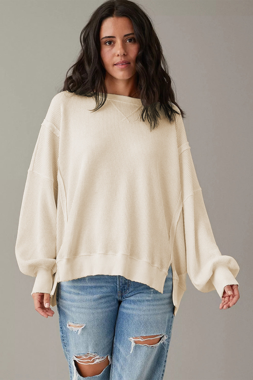 Gray waffle knit oversized long sleeve top with bishop sleeves and split design by Mommas Hive.