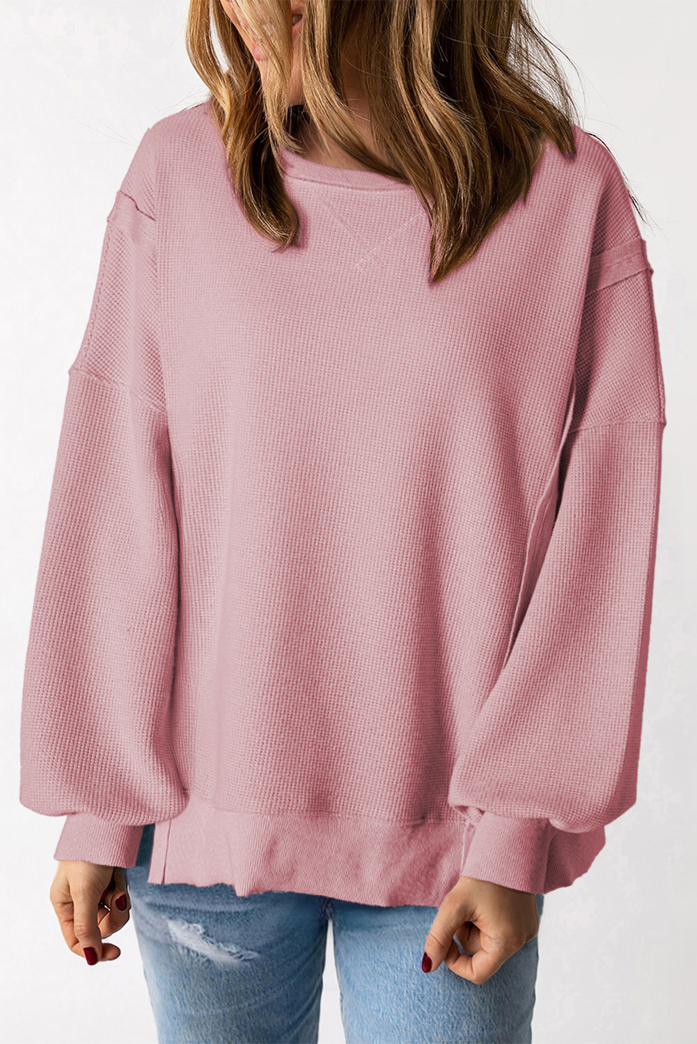 Gray waffle knit oversized top with bishop sleeves and split design, by Mommas Hive, long sleeve casual essential.