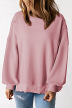 Gray waffle knit oversized top with bishop sleeves and split design, by Mommas Hive, long sleeve casual essential.