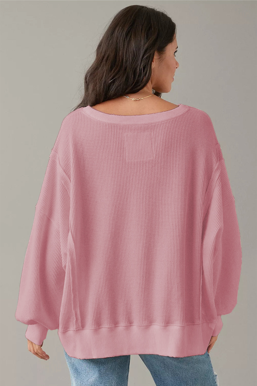 Gray waffle knit oversized top with bishop sleeves and split design from Mommas Hive, long sleeve casual fashion for women.