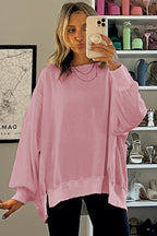 Gray waffle knit oversized long sleeve top with bishop sleeves and split design by Mommas Hive.