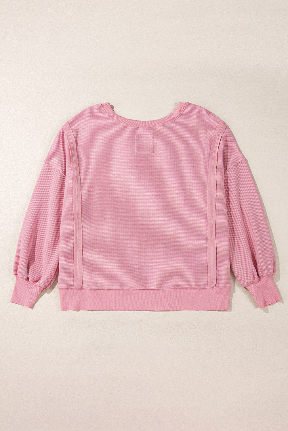 Gray waffle knit oversized long sleeve top with bishop sleeves and split design by Mommas Hive.