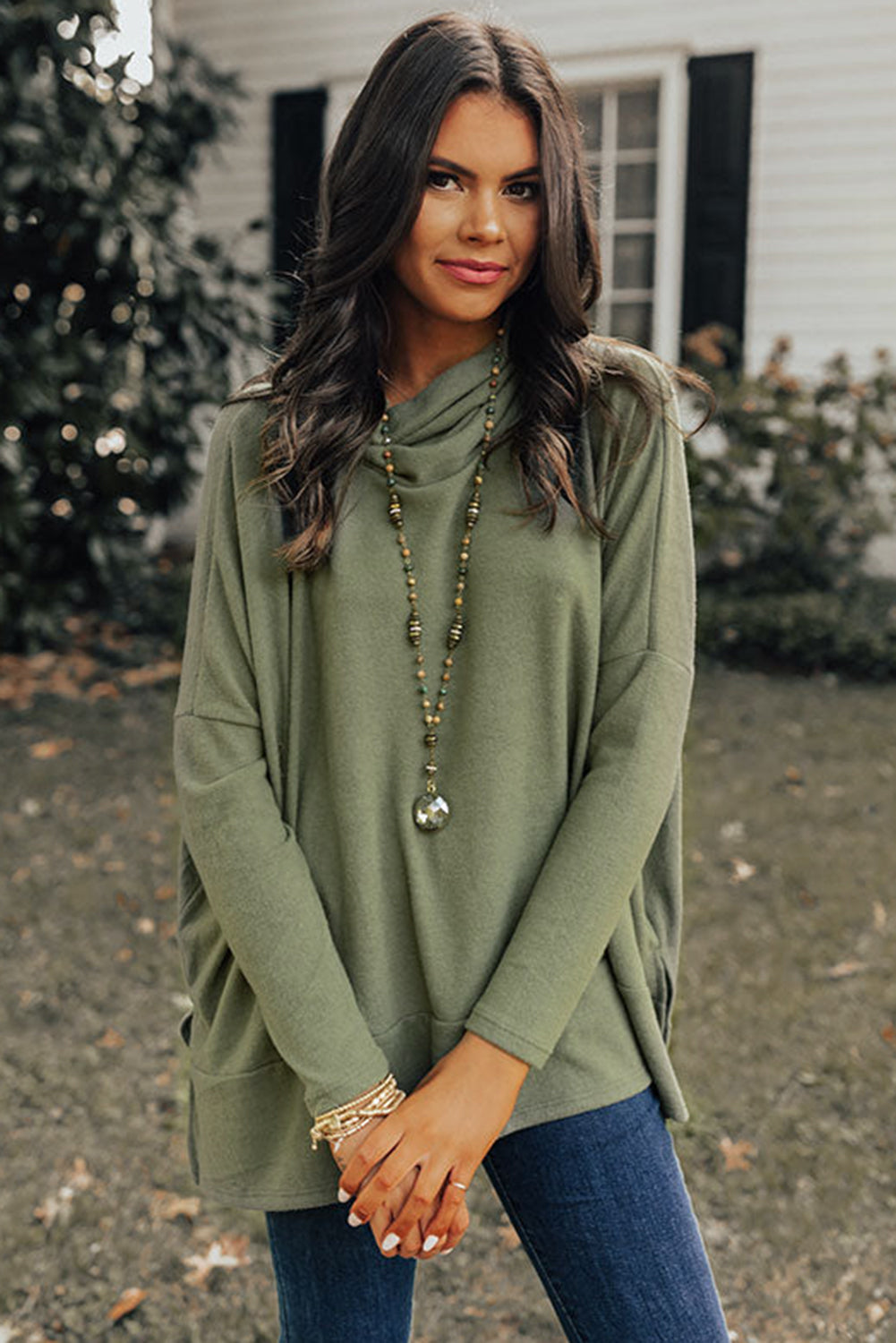 Jungle green Mommas Hive cowl neck shift tunic top with long sleeves, made of polyester, cotton, and elastane fabric.