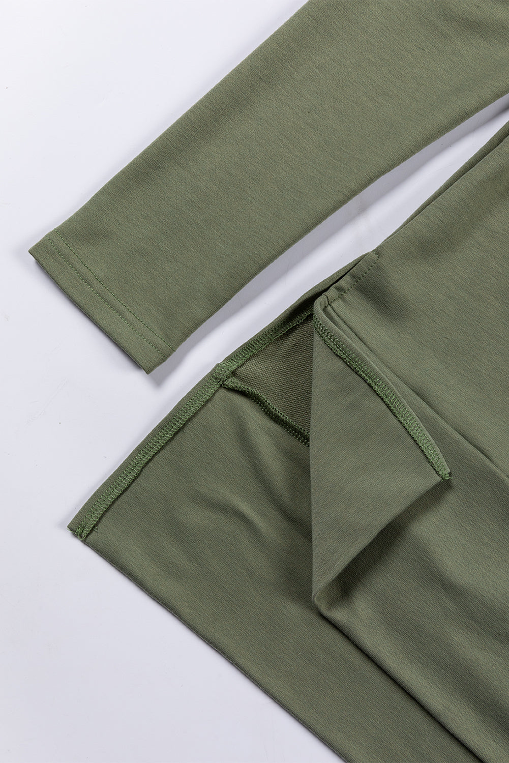 Mommas Hive jungle green long sleeve cowl neck shift tunic top made of polyester, cotton, and elastane fabric.