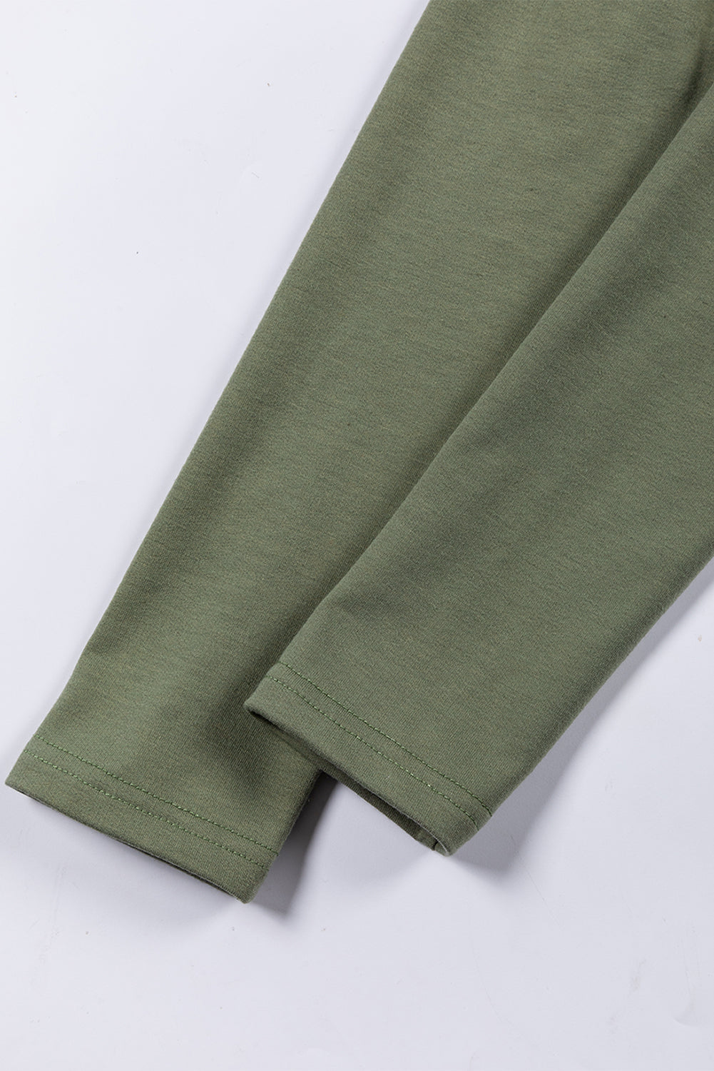 Jungle green Mommas Hive cowl neck shift tunic top with long sleeves, made of polyester, cotton, and elastane fabric.