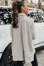 Jungle green Mommas Hive long sleeve cowl neck shift tunic top made of polyester, cotton, and elastane, styled with a relaxed fit.