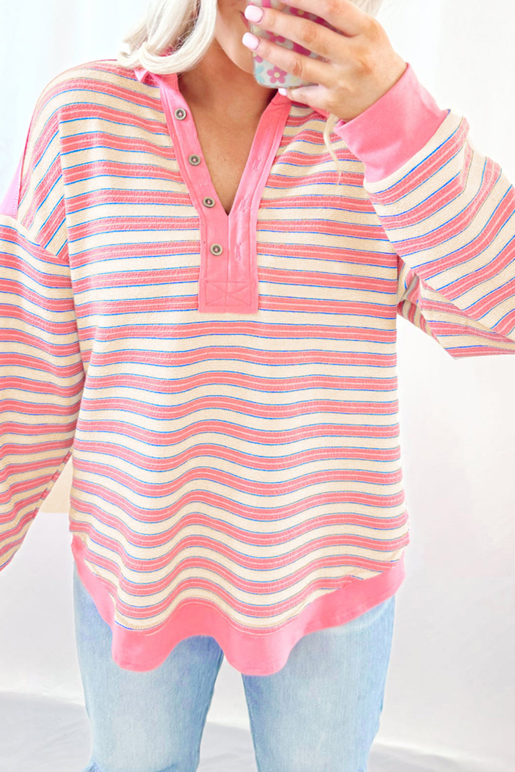 Red stripe long sleeve top by Mommas Hive featuring a V-neck, buttoned collar, and drop shoulder design.