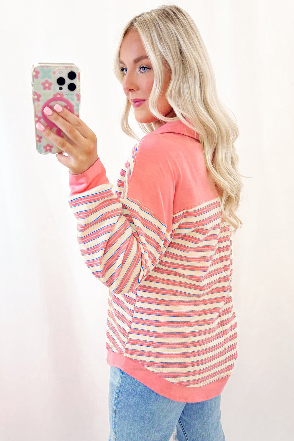 Red stripe long sleeve top by Mommas Hive featuring buttoned V-neck, collared, drop shoulder design in polyester-elastane fabric.