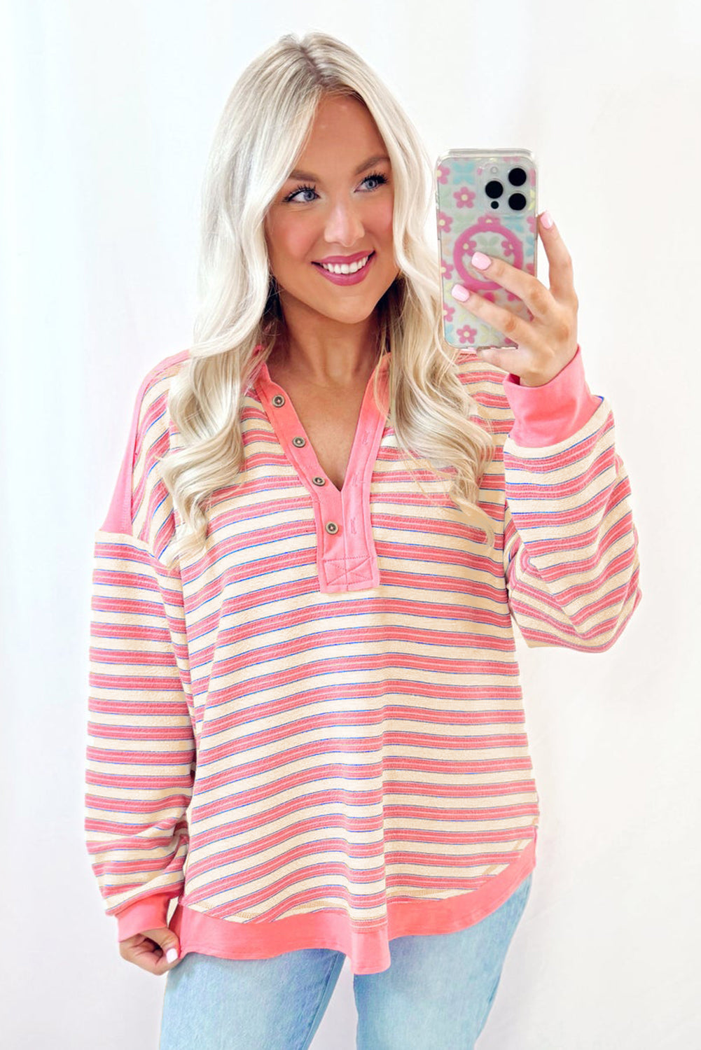 Red stripe long sleeve top by Mommas Hive with buttoned V-neck, collared design, and drop shoulder style.