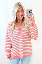 Red stripe long sleeve top by Mommas Hive with buttoned V-neck, collared design, and drop shoulder style.