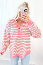 Red stripe long sleeve top by Mommas Hive featuring a V-neck, collared neckline, buttoned front, and drop shoulder design.