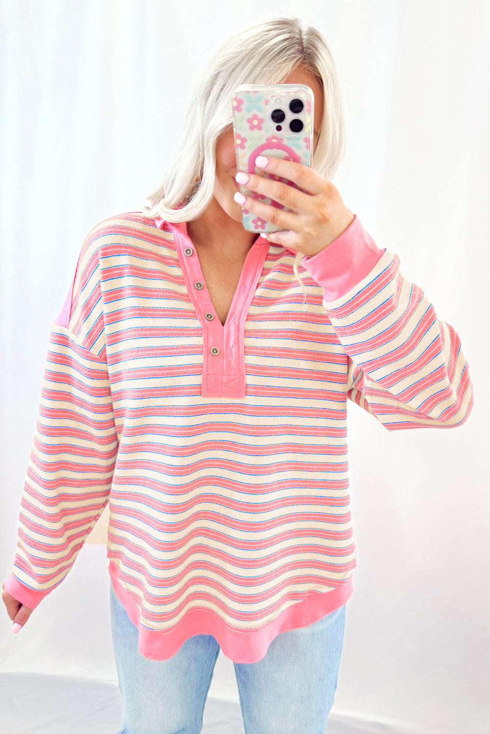 Red stripe long sleeve top by Mommas Hive featuring a V-neck, collared neckline, buttoned front, and drop shoulder design.