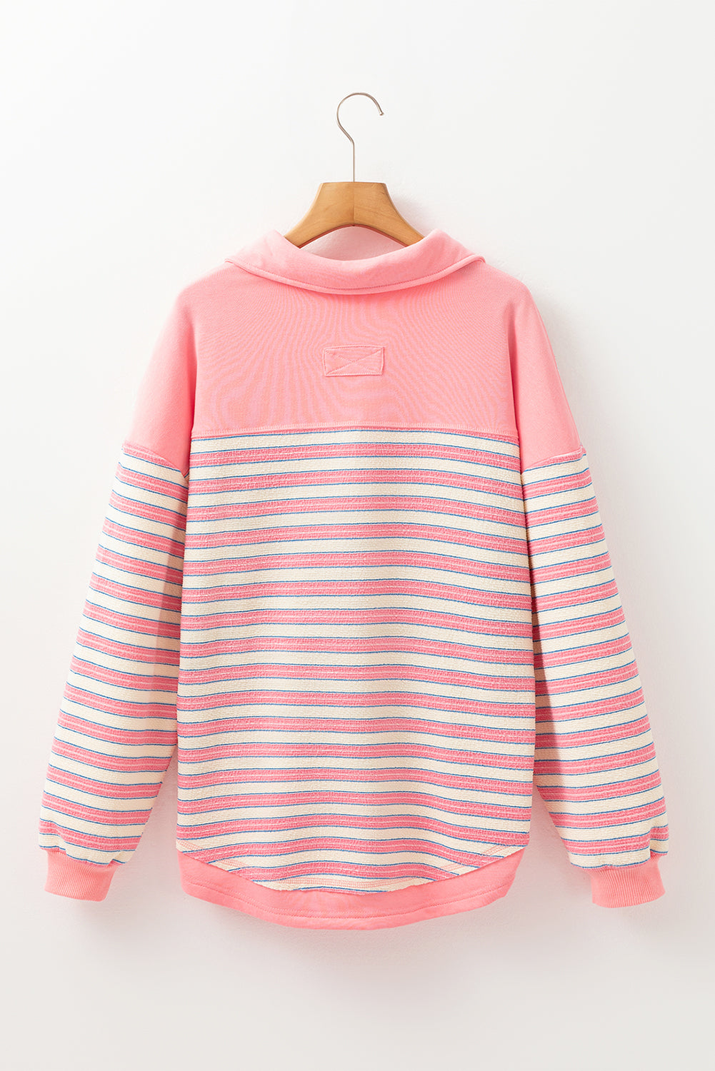 Red striped long sleeve top by Mommas Hive featuring a buttoned V-neck, collared, drop shoulder design, made of polyester and elastane.