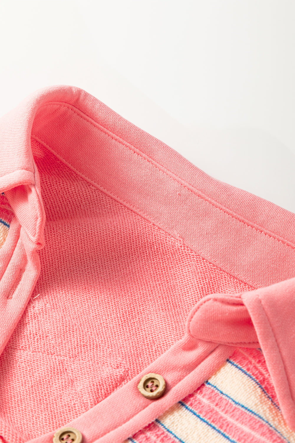 Red stripe long sleeve top by Mommas Hive featuring a buttoned V-neck, collared neck, and drop shoulder design.